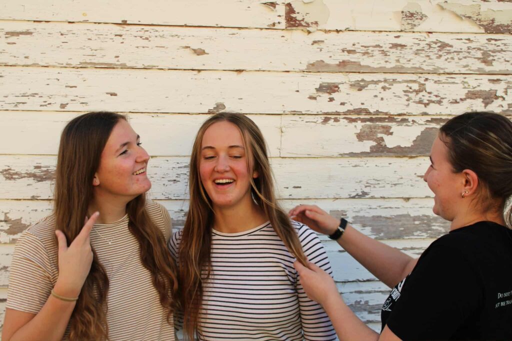 Fixing our hair before the next photo